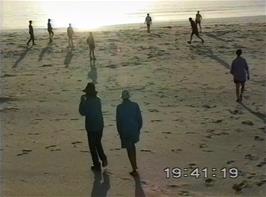 Paul Hardman and Lukas Wooller march across the silver sand to the dreamy sound of the harmonica